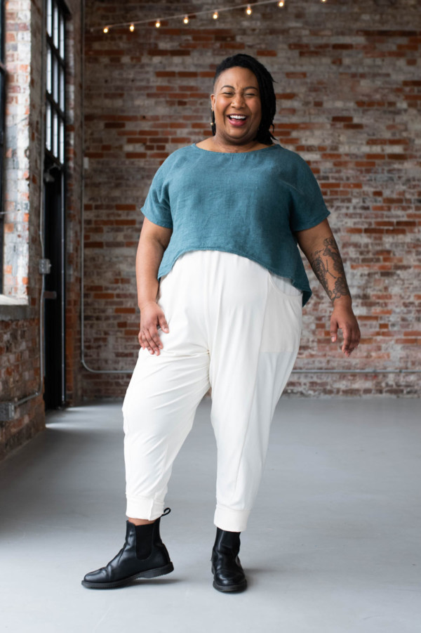 Ashley wearing a Strata Top and Arenite Pants