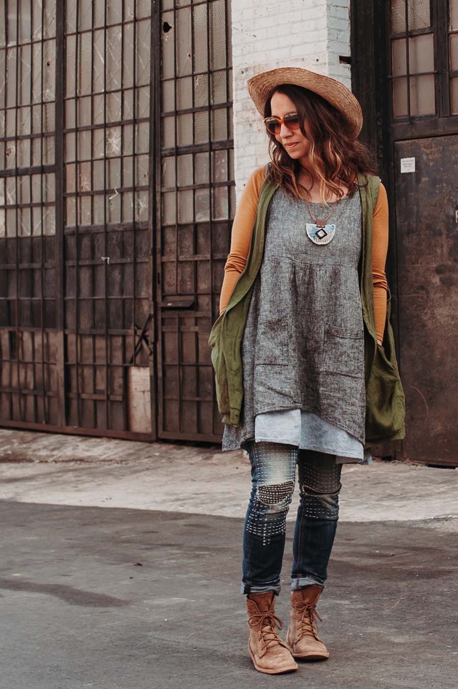 Meg wears a Forager Vest over a Metamorphic Dress and jeans