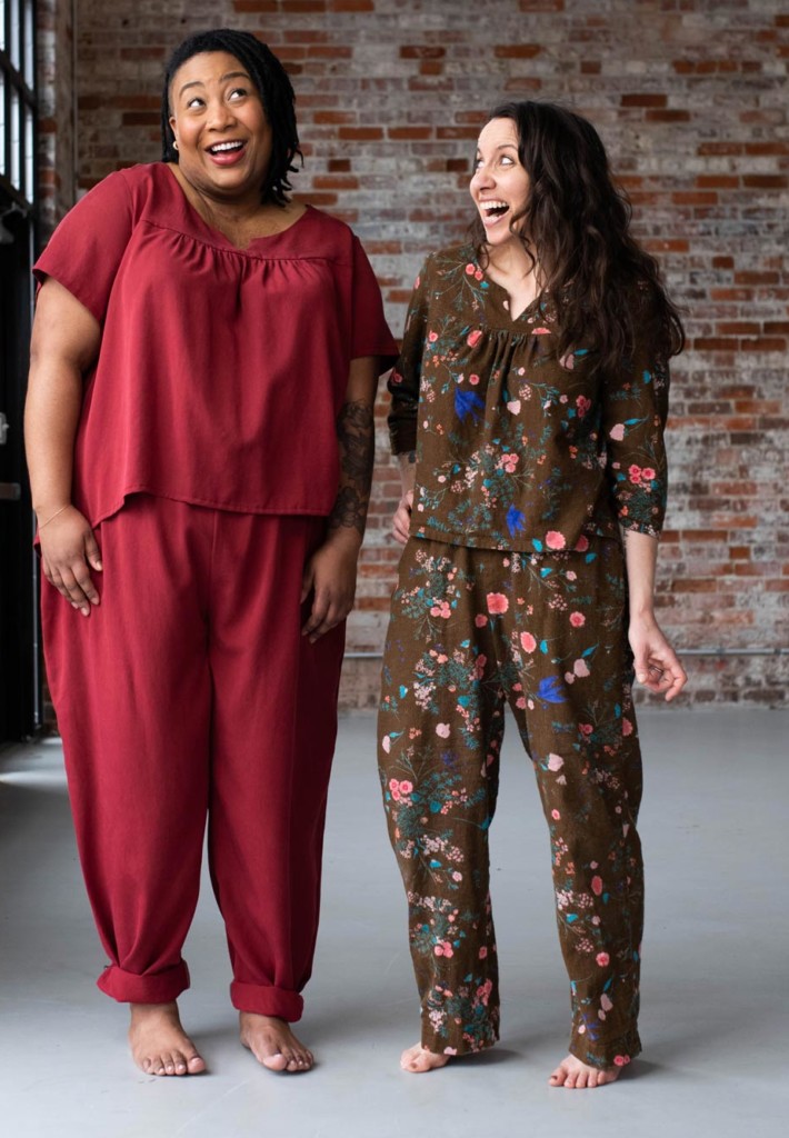 Meg and Ashley wear Nocturne Pajama sets. Ashley is wearing a scarlet red pair and Meg is wearing a brown floral pair.