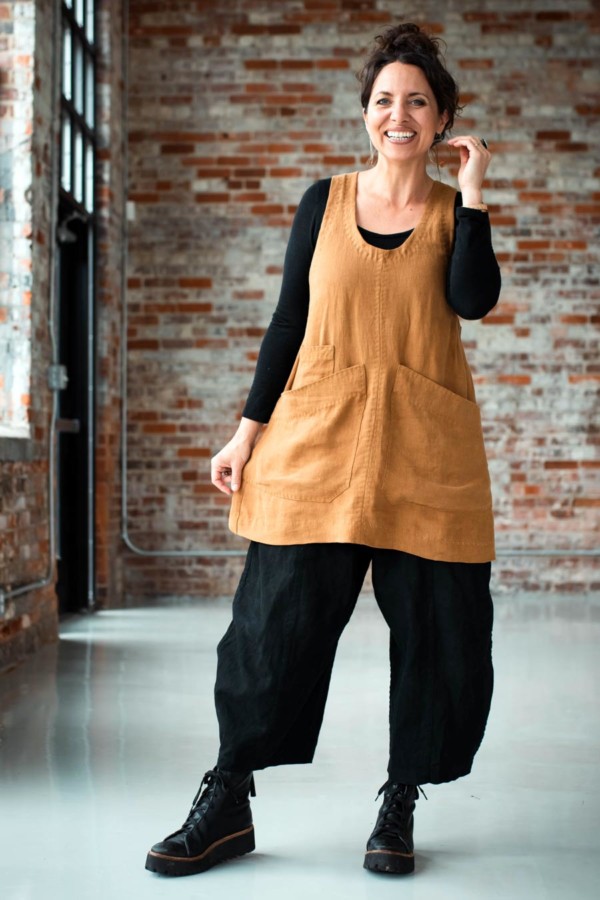 Meg wearing a caramel-colored Studio Tunic