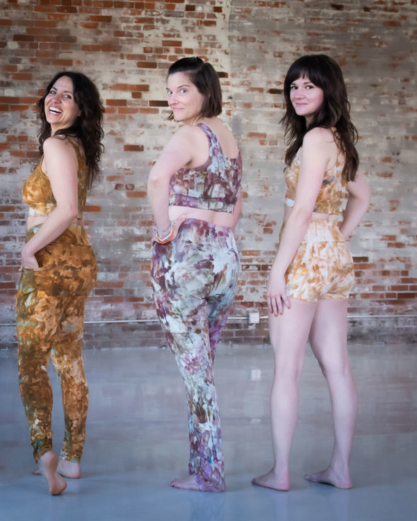 Meg, Brooke and Meredith look back over their shoulders wearing ice dyed Limestone Leggings and Tops