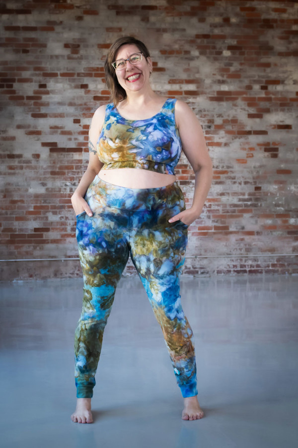 Shaerie wears a blue green ice dyed Limestone Leggings and Top set